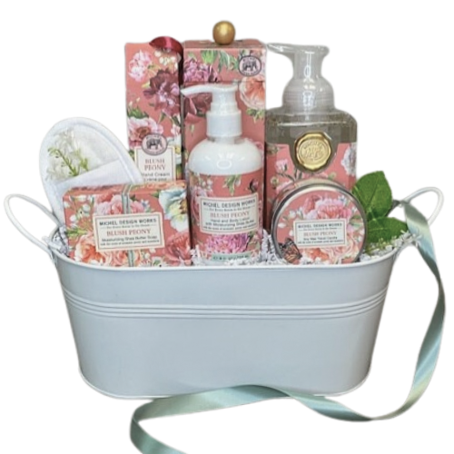 Pampering someone who is in need of some TLC.  This spa gift set includes Hand and Body Lotion, Moisturizing Shea Butter Soap, a Soy Candle, Loofah, Hand Cream, and Foaming Soap.  Offering three unique scents.
Choose your Collection –  Blush Peony features the Aromatic peony with a hint of mandarin, notes of gardenia, and touches of cedar and sandalwood