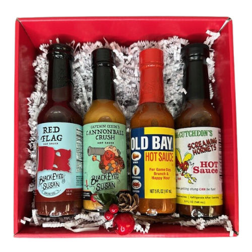 We have curated our favorite Maryland hot sauces into a Hot in Maryland gift box that will be sure please.  4 very different and unique flavors and heats.  A great gift set for Valentine's Day! Includes Old Bay hot sauce, Cannonball Crush by Death by Chocolate, Screaming Hornets, and a Red Flag by Black Eyed Susan Spice Co. Your gift box will be closed with a clear lid and wrapped with a festive tie bow.
