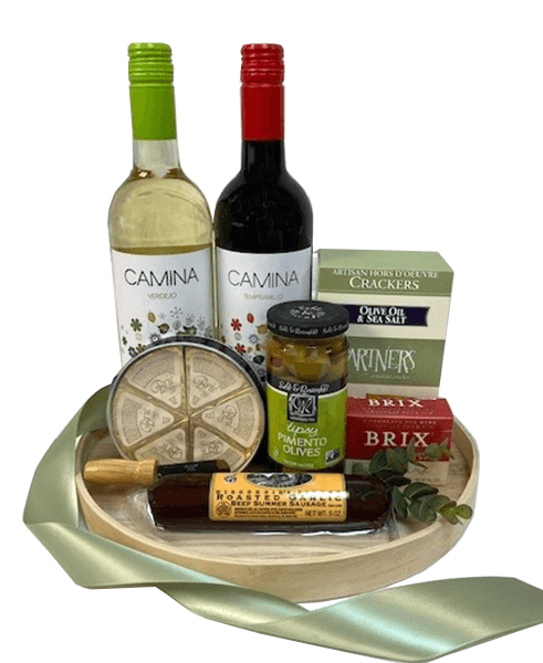 This gift basket includes a variety of sweet and savory gourmet foods, along with an attractive solid wood cheese serving and cutting board, a bottle of red and white wine, Creamy cheese, summer sausage, stuffed olives, an assortment of wine pairing chocolates, crackers and a cheese spreader.  Ready to open and enjoy. Makes a memorable gift!