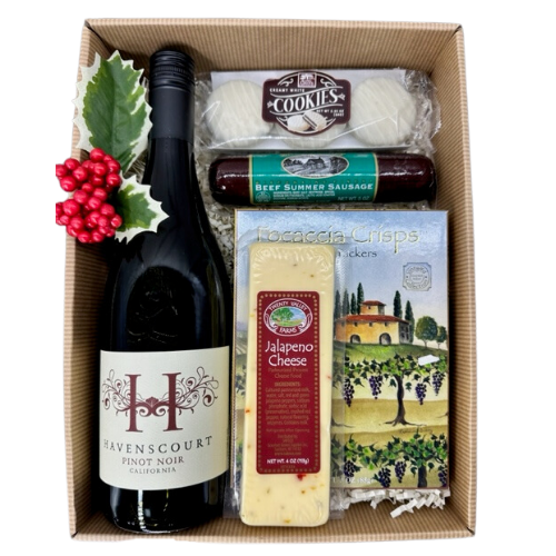 A perfect gift for any occasion.  This wine box set includes a bottle of red or white wine, and an assortment of wine pairing items to complete the set.  Your gift will include crackers, cheese, sausage, and chocolate covered cookies.  Your gift bow will be wrapped in a clear cello with a coordinating tie bow.