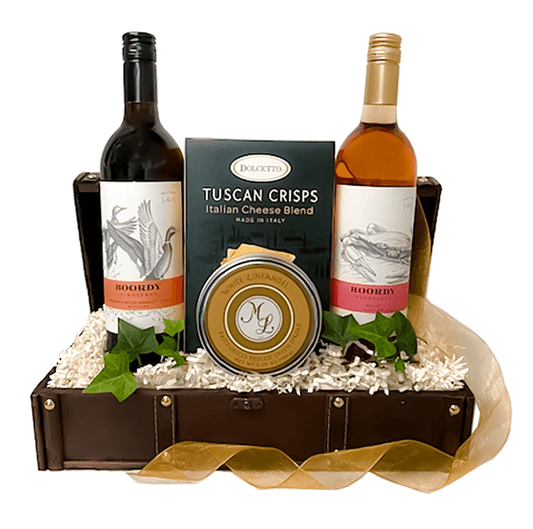 Enjoy the Icons of Maryland Wine Gift Basket – Beautifully arranged in a wooden crate. Filled with  two of Boordy’s most popular “Icons of Maryland” signature wines; Chambourcin Merlot and Boordy Blush.  Paired with Crackers, Merlot Cheddar cheese makes a perfect gift! This is one of our most requested wine baskets and is sure to please the most discriminatory wine lover! Your gift will be  wrapped in cello cello with a coordinating tie bow.